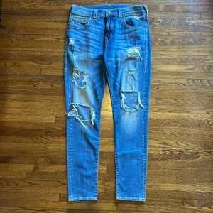 True Religion Men’s Blue Stretch Cotton Destroyed Slim Logan Fit Jeans